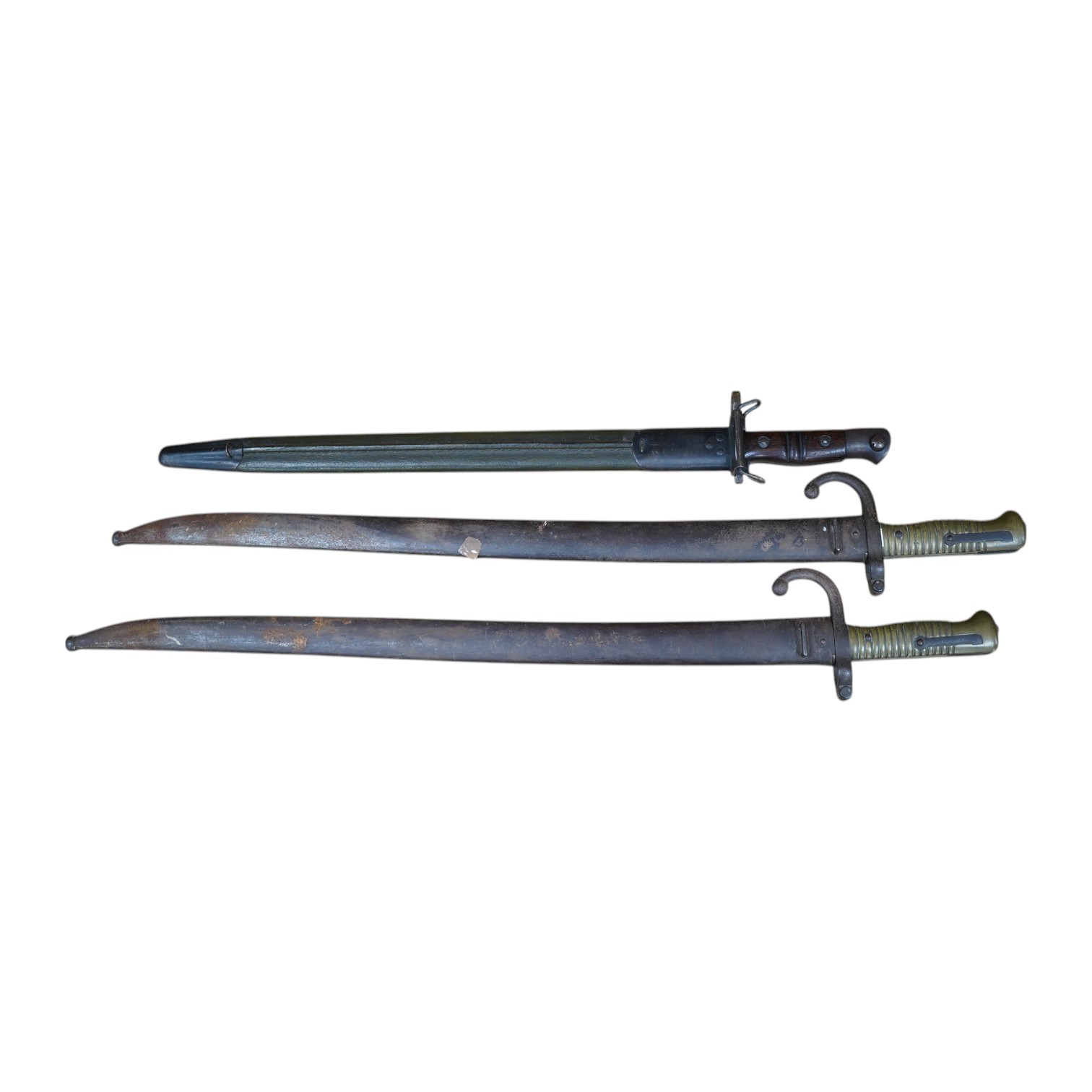 Two 19th century French bayonets and an American example, largest 71cm. Condition - fair